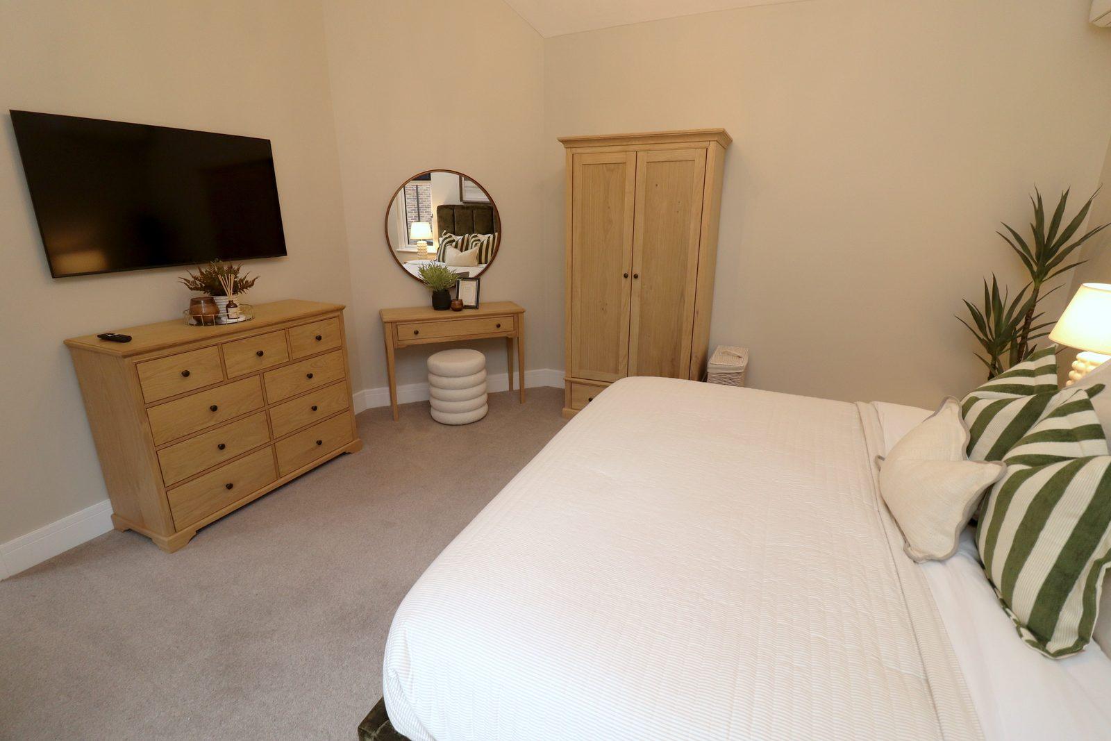 Oak chest, round mirror and wardrobe